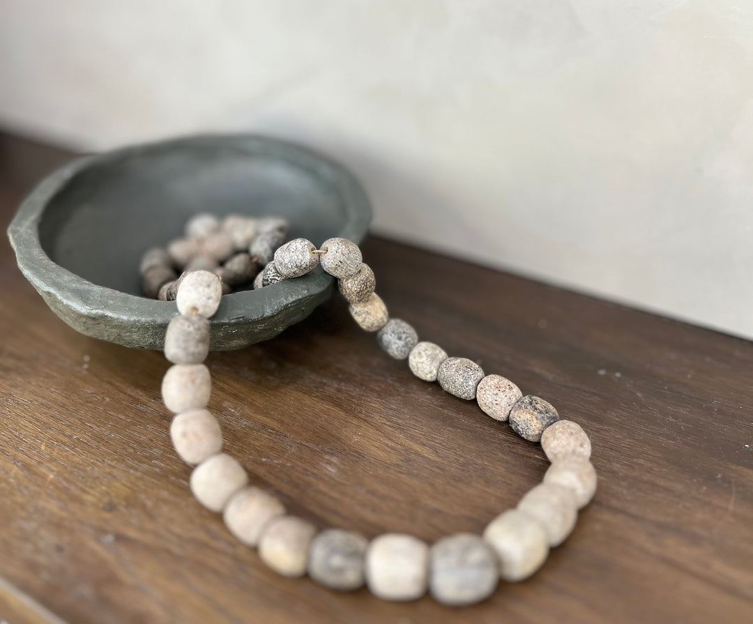 Fossilized Stegodon Stone Beads