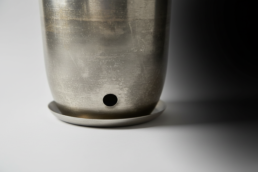 Detail shot of planter drainage hole